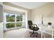 Office with large window providing natural light and view of backyard at 6401 S Forest St, Centennial, CO 80121