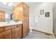 Bathroom with wood cabinets and a shower at 370 Terra Vista St, Brighton, CO 80601