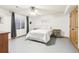 Basement bedroom with ceiling fan and wood dresser at 370 Terra Vista St, Brighton, CO 80601