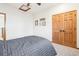 Spacious bedroom with a double bed and double door closet at 370 Terra Vista St, Brighton, CO 80601