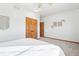 Bright bedroom featuring a double door closet and wood floors at 370 Terra Vista St, Brighton, CO 80601