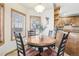 Bright breakfast nook with wood table and chairs, offering a casual dining space at 370 Terra Vista St, Brighton, CO 80601