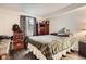Bedroom with hardwood floors and large windows that provide lots of natural light at 1358 S Irving St # 53, Denver, CO 80219