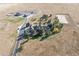 A sprawling estate with mature trees, equestrian facilities and stunning aerial views of the vast property at 9250 Steeplechase Dr, Franktown, CO 80116