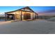 Exterior of a charming barn with lights at 9250 Steeplechase Dr, Franktown, CO 80116
