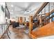 Finished basement features a spacious rec area, wet bar, and home gym at 9250 Steeplechase Dr, Franktown, CO 80116