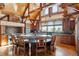 Gourmet kitchen with large island and wooden cabinetry at 9250 Steeplechase Dr, Franktown, CO 80116
