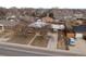 Aerial view showing the house, driveway, yard, and surrounding neighborhood at 11310 Irma Dr, Northglenn, CO 80233