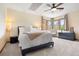 Serene bedroom featuring plush carpet, natural light, and neutral tones at 2122 Cramner Ct, Evergreen, CO 80439