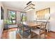 Formal dining room featuring a chandelier and an expansive table for entertaining at 2122 Cramner Ct, Evergreen, CO 80439