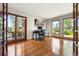 Bright home office with a large window and access to the deck at 2122 Cramner Ct, Evergreen, CO 80439