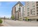 This is a view of a modern condo building in the city, featuring expansive windows and sleek architecture at 1401 Wewatta St # 202, Denver, CO 80202