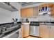 Kitchen features stainless steel appliances, granite countertops and ample cabinet storage space at 1401 Wewatta St # 202, Denver, CO 80202