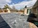 Backyard includes detached garage space, well kept grass, and an AC unit at 1801 S Grove St, Denver, CO 80219