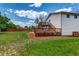 Expansive backyard with lush lawn, wooden deck, and privacy fence, perfect for outdoor gatherings at 9040 Raleigh St, Westminster, CO 80031