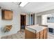 Unfinished basement space with laundry hookups, sink, work area, and bathroom at 9040 Raleigh St, Westminster, CO 80031