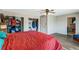 Spacious bedroom with wood floors, ceiling fan, and closets at 9040 Raleigh St, Westminster, CO 80031