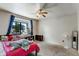 Cozy bedroom with a plush bed, window view, and ceiling fan at 9040 Raleigh St, Westminster, CO 80031
