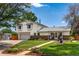 Charming two-story home features a brick facade, landscaped yard, and an attached two-car garage at 9040 Raleigh St, Westminster, CO 80031