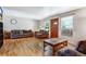 Cozy living room featuring hardwood floors, comfortable furniture, and natural light at 9040 Raleigh St, Westminster, CO 80031