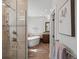 Beautifully renovated main bathroom features soaking tub, glass shower and modern finishes at 484 Hyland Dr, Castle Rock, CO 80108