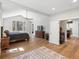 Spacious main bedroom with hardwood floors, ceiling fan, ensuite access and natural light at 484 Hyland Dr, Castle Rock, CO 80108