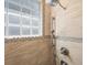 Stylish shower with glass blocks, tile surround and chrome shower head at 484 Hyland Dr, Castle Rock, CO 80108