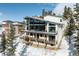 Luxury home with expansive deck and mountain views at 26467 Bell Park Dr, Evergreen, CO 80439