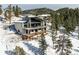 Luxury home with expansive decks and mountain views at 26467 Bell Park Dr, Evergreen, CO 80439