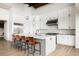 Modern kitchen with large island and stainless steel appliances at 26467 Bell Park Dr, Evergreen, CO 80439