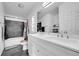 Clean bathroom with a double vanity and a shower/tub combo at 4360 E 70Th Ct, Commerce City, CO 80022