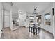 Small dining area with a table and chairs near entryway at 4360 E 70Th Ct, Commerce City, CO 80022