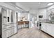 Modern kitchen with stainless steel appliances and an island at 4360 E 70Th Ct, Commerce City, CO 80022