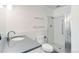 Bathroom with shower stall, toilet, and vanity with countertop at 755 S Alton Way # 9D, Denver, CO 80247