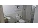 This bathroom features a shower with glass door and white tiled walls at 755 S Alton Way # 9D, Denver, CO 80247