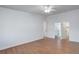 Bright bedroom featuring hardwood floors, ceiling fan and closet at 755 S Alton Way # 9D, Denver, CO 80247