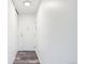 Hallway featuring front door and storage closet at 755 S Alton Way # 9D, Denver, CO 80247