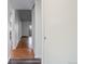 Hallway with wood floors and closet at 755 S Alton Way # 9D, Denver, CO 80247