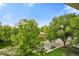 Enjoy the building's location with mature trees and a neighborhood view with parking at 755 S Alton Way # 9D, Denver, CO 80247