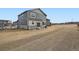 View of the home's backyard with lawn ready for landscaping at 11052 Snowdon St, Parker, CO 80134