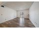 Simple living room with wood-style floors, a sliding door to a balcony, and natural light at 16259 W 10Th Ave # A4, Golden, CO 80401
