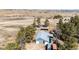 An aerial view of the property highlighting outbuildings at 1991 County Road 132, Elizabeth, CO 80107
