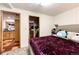 Cozy bedroom with views into the kitchen and adjoining rooms at 1991 County Road 132, Elizabeth, CO 80107