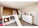 Unique bedroom featuring a custom bed with slide and a modern white dresser at 1991 County Road 132, Elizabeth, CO 80107