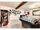 Cozy bedroom with unique lighting, decor, and a comfortable bed at 1991 County Road 132, Elizabeth, CO 80107