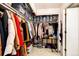 Walk-in closet features ample storage space with built-in shelving and organized hanging areas at 1991 County Road 132, Elizabeth, CO 80107