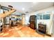 Open living space with tile floors and access to the kitchen at 1991 County Road 132, Elizabeth, CO 80107