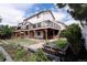The backyard features a raised garden, and two-level deck, and easy backyard access at 1772 Eisenhower, Louisville, CO 80027