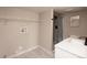 Clean bathroom with white vanity, modern fixtures, and a glass-enclosed shower at 1772 Eisenhower, Louisville, CO 80027