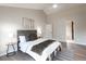 Comfortable bedroom boasts vaulted ceilings, hardwood flooring and decorative details at 1772 Eisenhower, Louisville, CO 80027